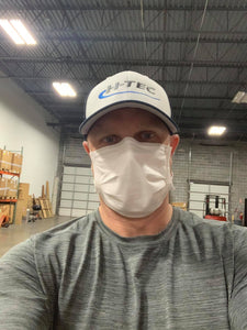 Image of Chris Glass of Marietta Georgia wearing a Luosh American Made Face Masks in his workplace.  He comments that the mask is comfortable, professional, and a great value.