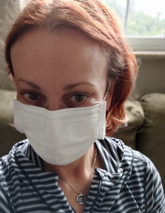 Image of Deborah Gilliss wearing a Luosh American Made face mask to demonstrate exceptional fit and fine quality of their comfortable fabrics and construction.