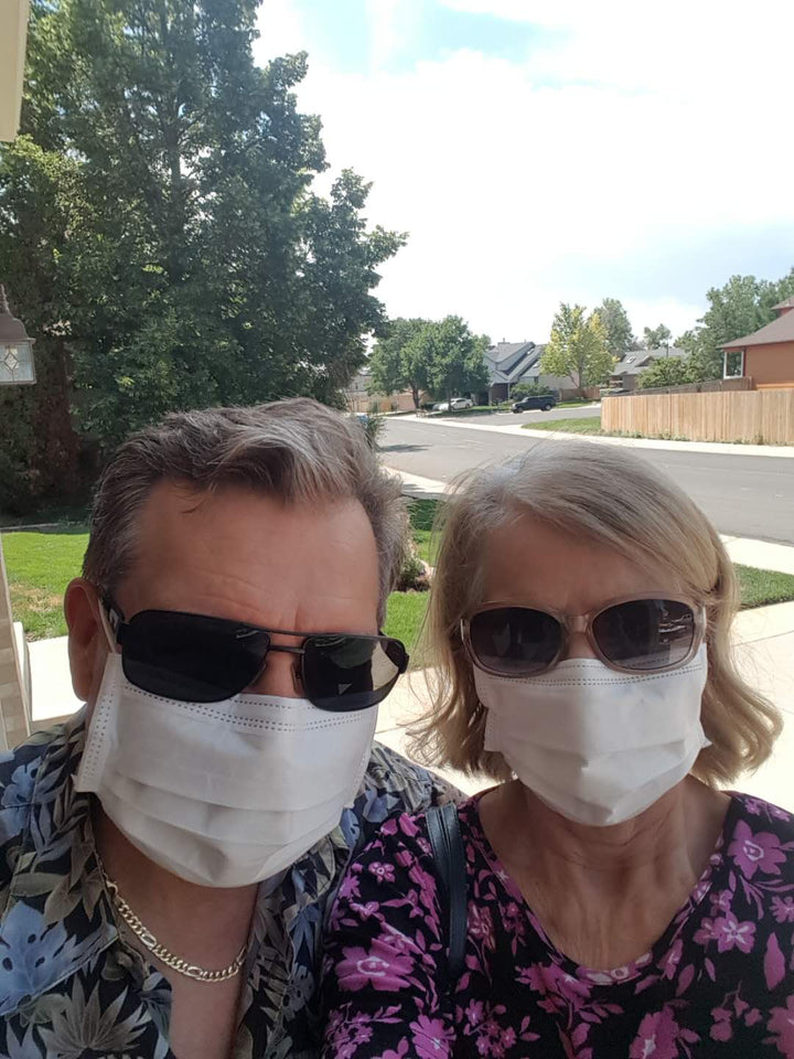 Image of Ricky and Cindy J. wearing Luosh American Made Face Masks outdoors.
